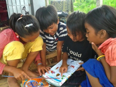 The children in Oudong Village are now using materials developed by Alongsiders International.