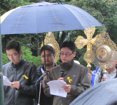 Ted Ng read scripture at the Ecumenical Prayer Rally for Peace and Human Rights in Hong Kong in front of the Chinese Consulate. 