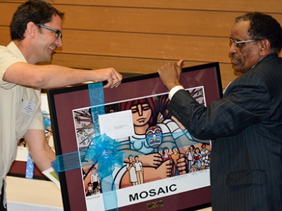 Loren Balisky representing Kinbrace as they received a Human Rights Award from MOSAIC.