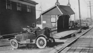 Collingwood Station [on the B.C.E.R.] Central Park line Photograph shows an automobile parked next to the station platform. 1930s AM336-S3-2-: CVA 677-386