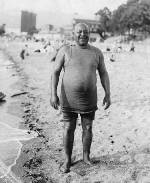 Joe Fortes on the beach in the West End. Photo by Stuart Thompson, about 1905. Vancouver Archives: AM336-S3-2-: CVA 677-440 