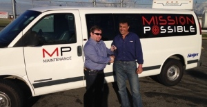 Mission Possible's Brian Postlewaite thanks Helijet CEO ***  *** for the van.