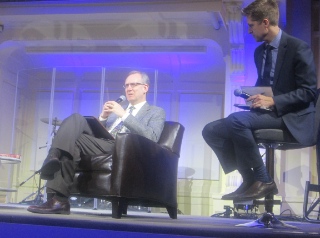 Jeff Greeman (left), president of Regent College, with moderator James Borkowski.
