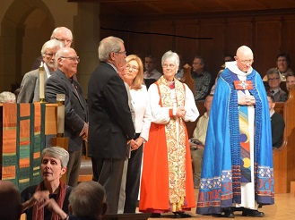 Bishop Melissa Skelton sought God's blessing in her prayer; to her right is rector and dean of Christ Church Cathedral, Peter Elliott. Photo by Randy Murray.