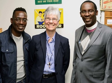 Bishop Fred Sheldon Mwisegwa (right) with his old friend Michael Musherure and Bishop Melissa Skelton.